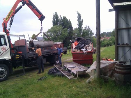 Chris on the left and Tom on the right loading up the company truck with more goods for the yard.